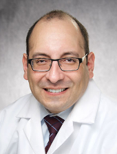 Dr Carlos E Vigil